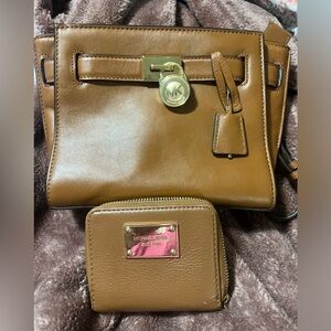 Michael Kors purse and matching wallet.